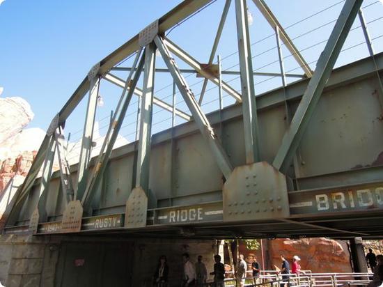 You'll pass under this bridge on your way to ride the Radiator Springs Racers