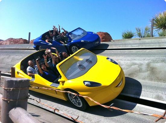 Taking a fast turn on the Radiator Springs Racers ride