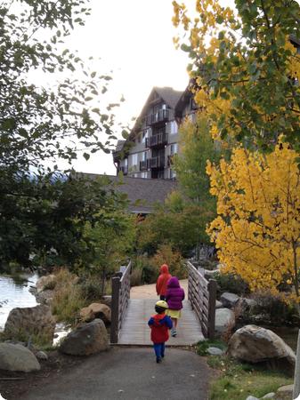 Kids cross the bridge to the Suncadia Lodge