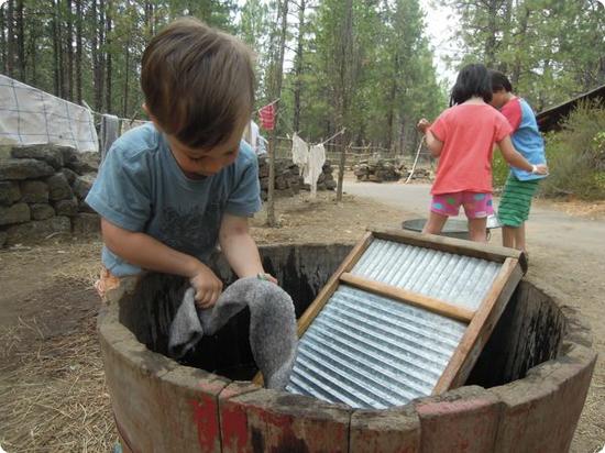 Eilan learns how to wash clothes the old fashioned way