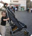 Everest pushing his stroller in the Campo De' Fiori in Rome