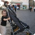 Everest pushing his stroller in the Campo De' Fiori in Rome