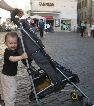 Everest pushing his stroller in the Campo De' Fiori in Rome