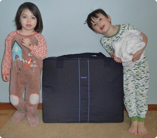 Everest and Darya help me test the Baby Bjorn Travel Cot