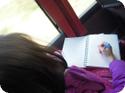 Darya draws the scenery in her journal on one of our bus trips